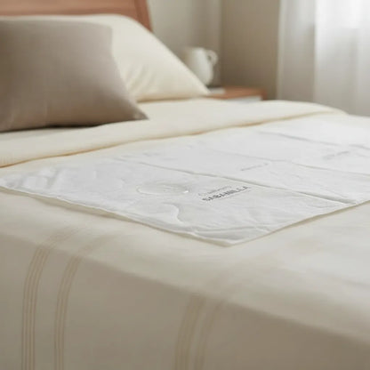 Protector de Cama 60x90 cm Cranberry – Pack 10 Unidades | Absorbente y Desechable